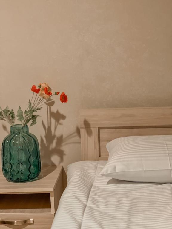 Letto o letti in una camera di Mestia Rooms