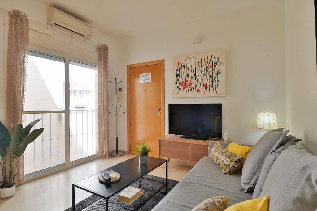 Televízia a/alebo spoločenská miestnosť v ubytovaní C41 - Modern & Comfy Flat City Center