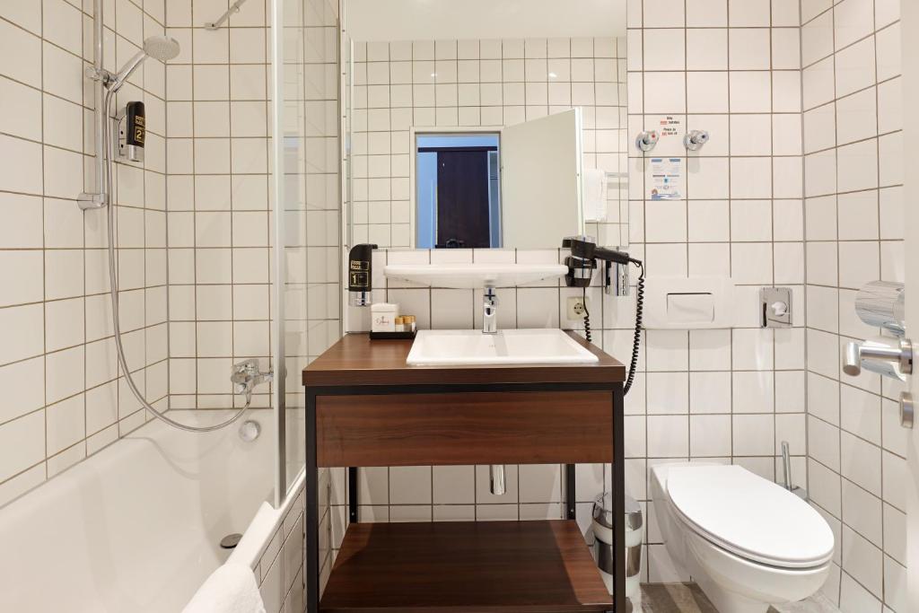 Um banheiro em Trip Inn Hotel Messe Westend