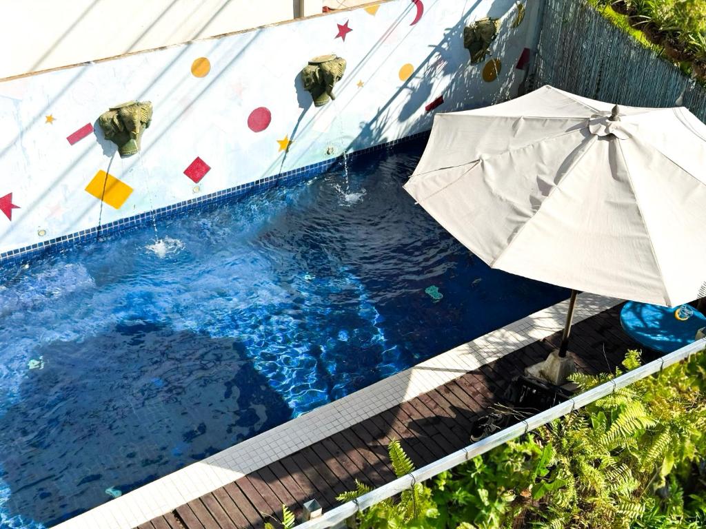 Bazén v ubytování VPlus Hotel nebo v jeho okolí
