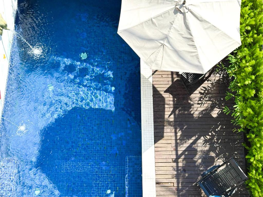 Bazén v ubytování VPlus Hotel nebo v jeho okolí