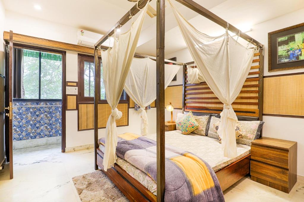 Postel nebo postele na pokoji v ubytování House Of Comfort Delhi