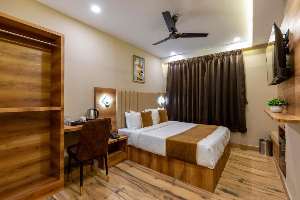 Postel nebo postele na pokoji v ubytování Hotel Zara International