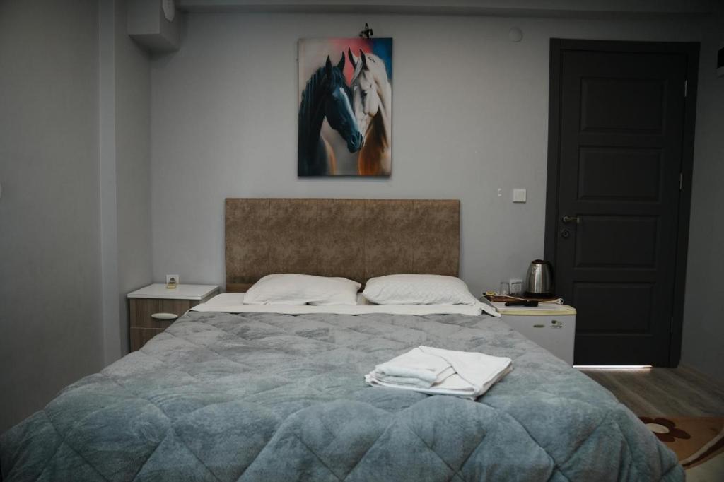 Postel nebo postele na pokoji v ubytování Birds inn