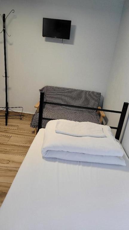 Postel nebo postele na pokoji v ubytování Byzanthin Hostel