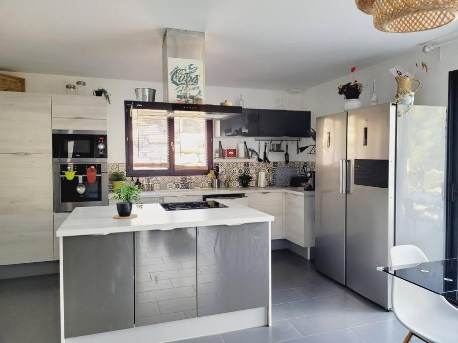 Kuchyň nebo kuchyňský kout v ubytování Maison avec vue sur forêt