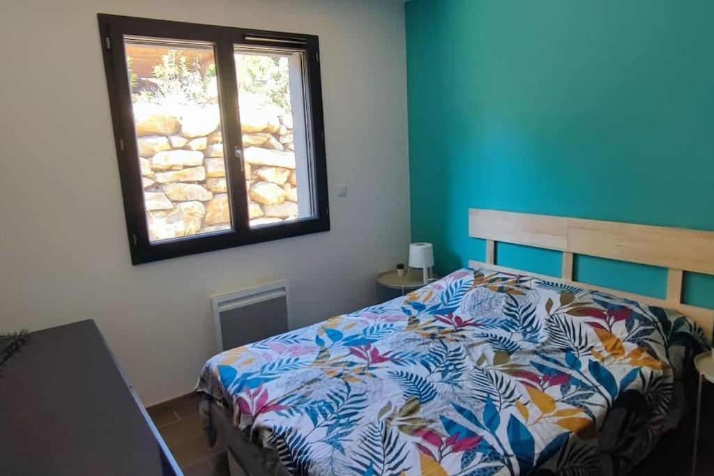 Postel nebo postele na pokoji v ubytování Maison avec vue sur forêt