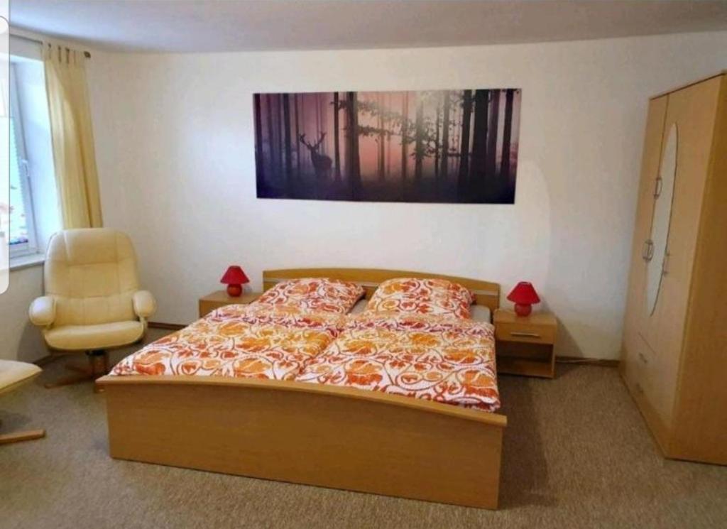 Postel nebo postele na pokoji v ubytování Haus Flora