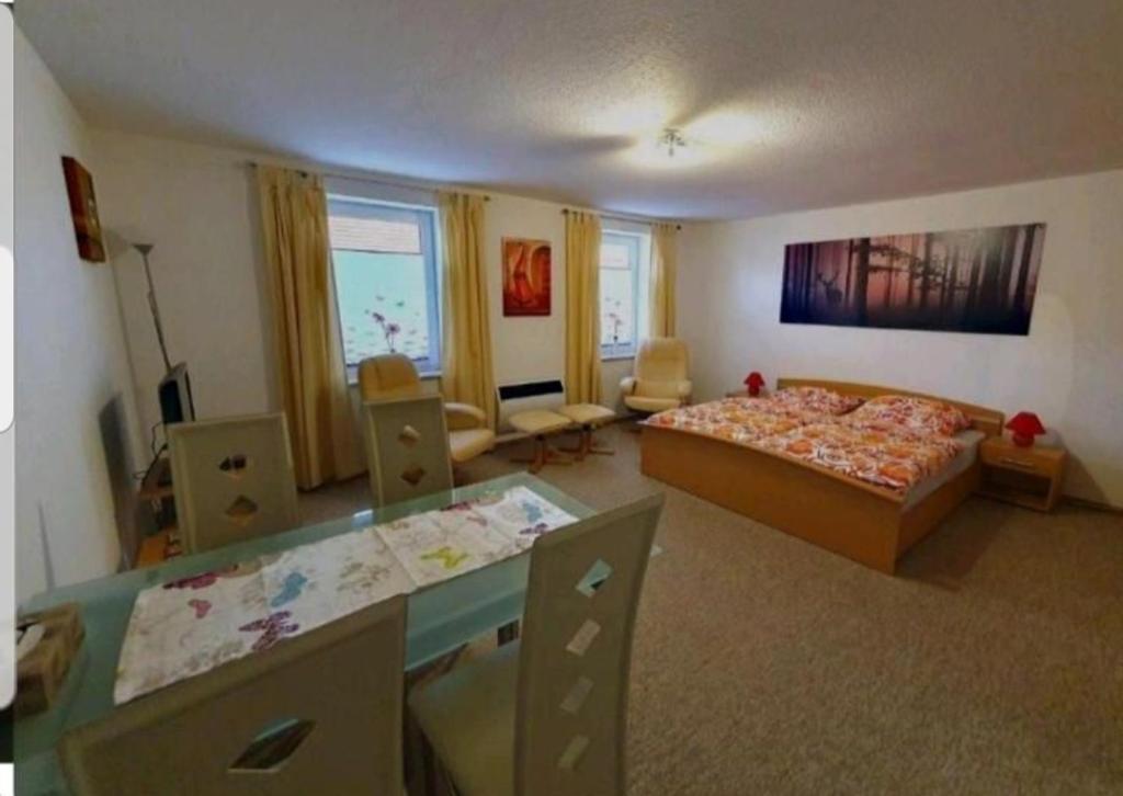 Postel nebo postele na pokoji v ubytování Haus Flora