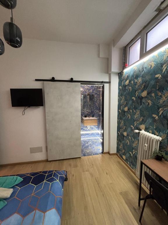 Postel nebo postele na pokoji v ubytování Milano underground