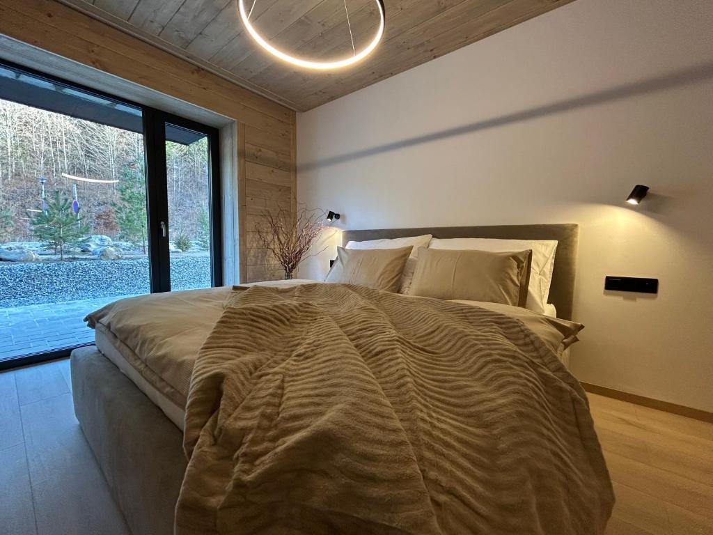 Postel nebo postele na pokoji v ubytování Apartmány Dolina