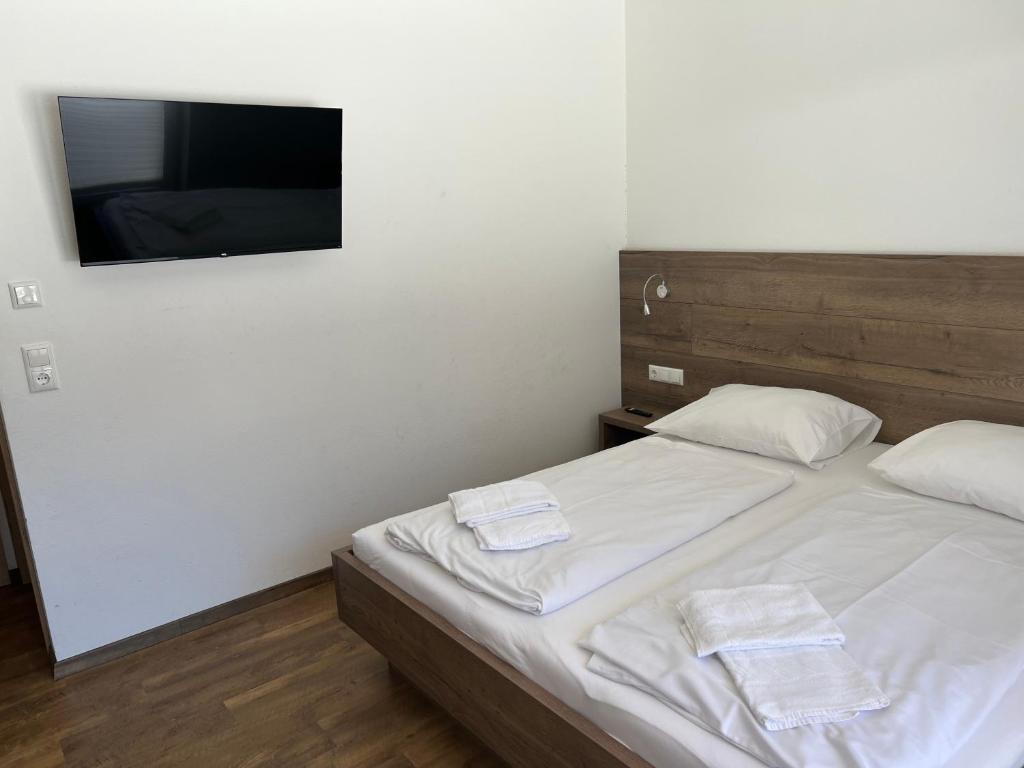 Postel nebo postele na pokoji v ubytování Merwede Wasserfallblick