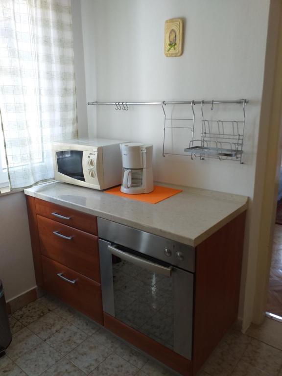 Kuchyň nebo kuchyňský kout v ubytování Levak Apartments - Apt. 2