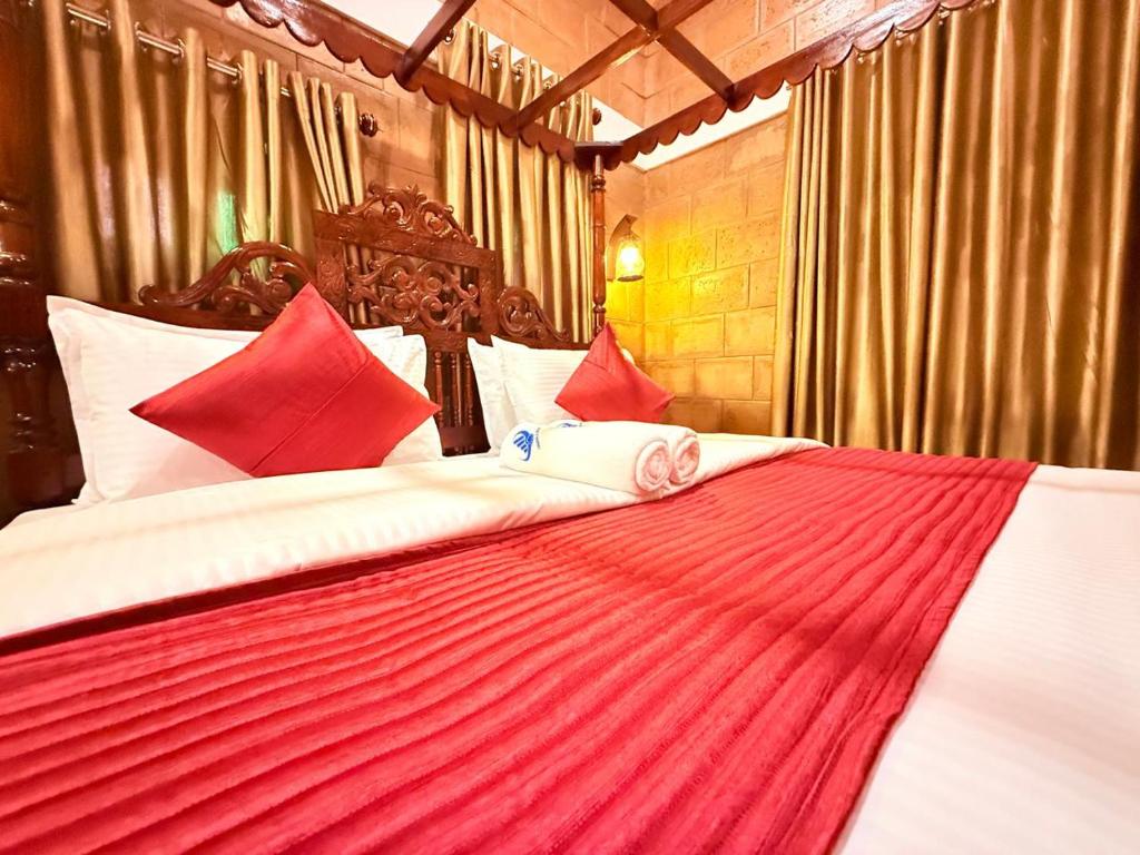 Postel nebo postele na pokoji v ubytování Credible Heritage Resort