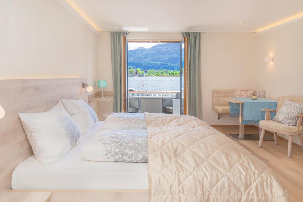 Ένα ή περισσότερα κρεβάτια σε δωμάτιο στο Arndt's Bootshaus