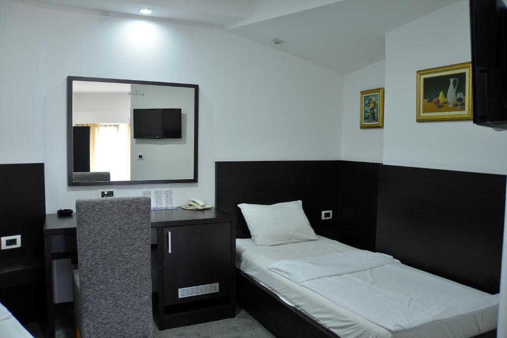 Postel nebo postele na pokoji v ubytování Hotel Golf