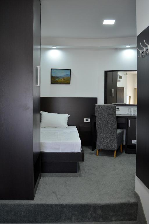 Postel nebo postele na pokoji v ubytování Hotel Golf