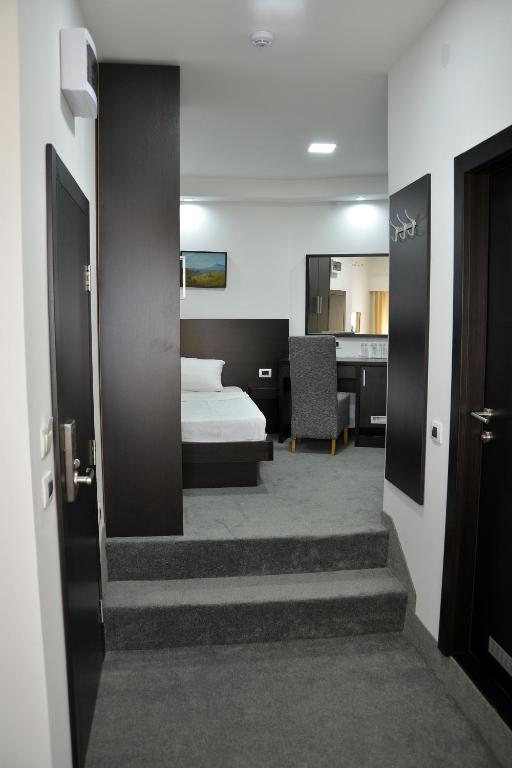 Postel nebo postele na pokoji v ubytování Hotel Golf