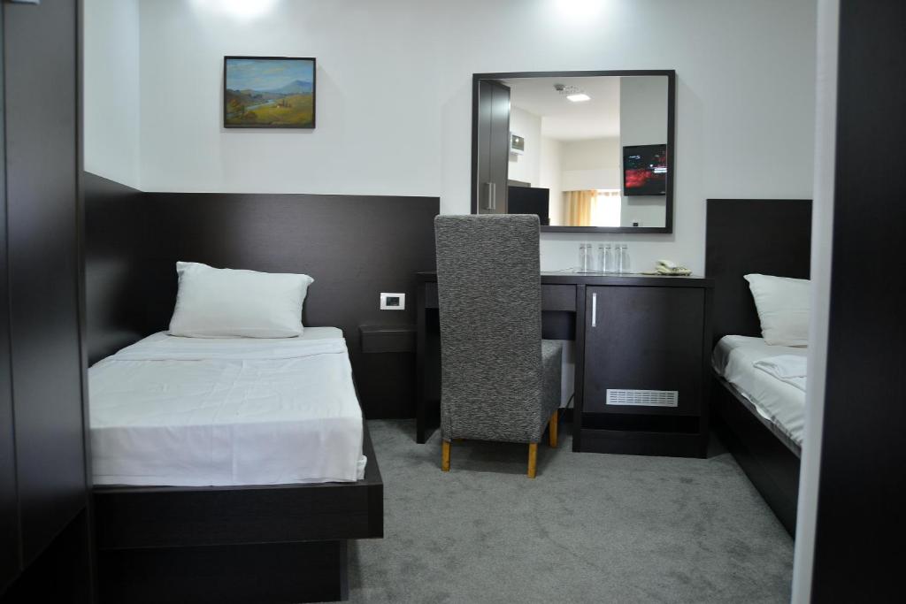 Postel nebo postele na pokoji v ubytování Hotel Golf