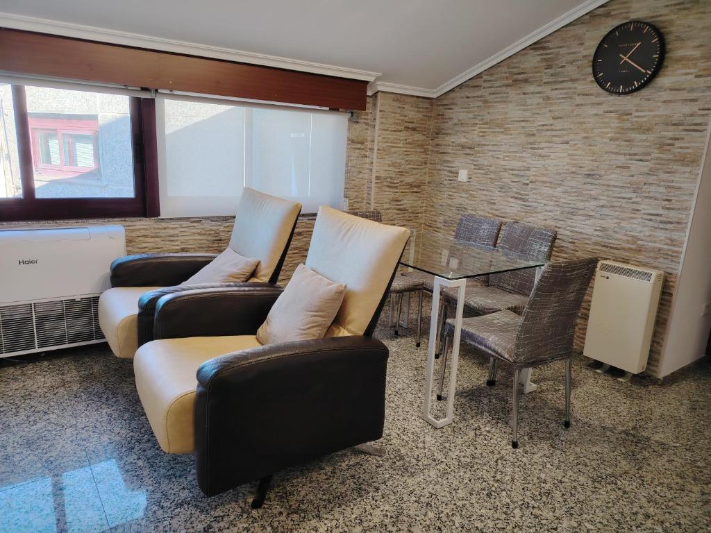 A seating area at Ático tipo Loft centro de Mugardos