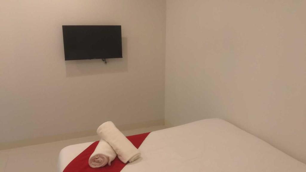 TV a/nebo společenská místnost v ubytování OYO 1128 Hotel Sangco
