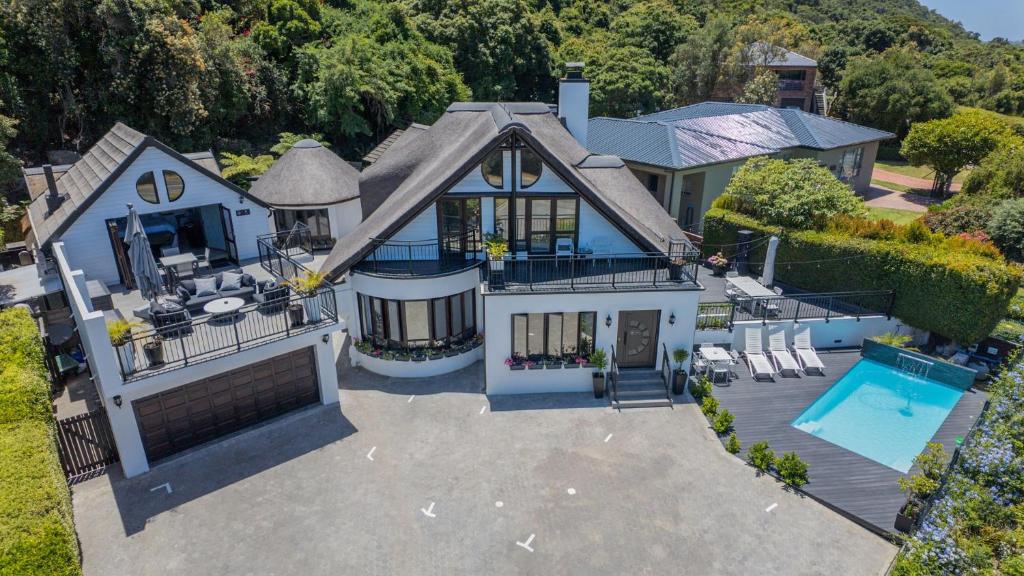 an overhead view of a house with a swimming pool at Cloverleigh Guest House in Wilderness