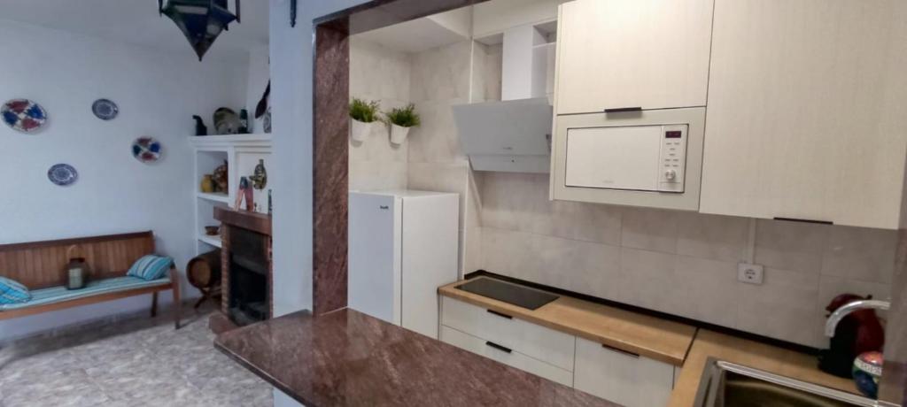 Kuchyň nebo kuchyňský kout v ubytování Casa Cueva Calatrava