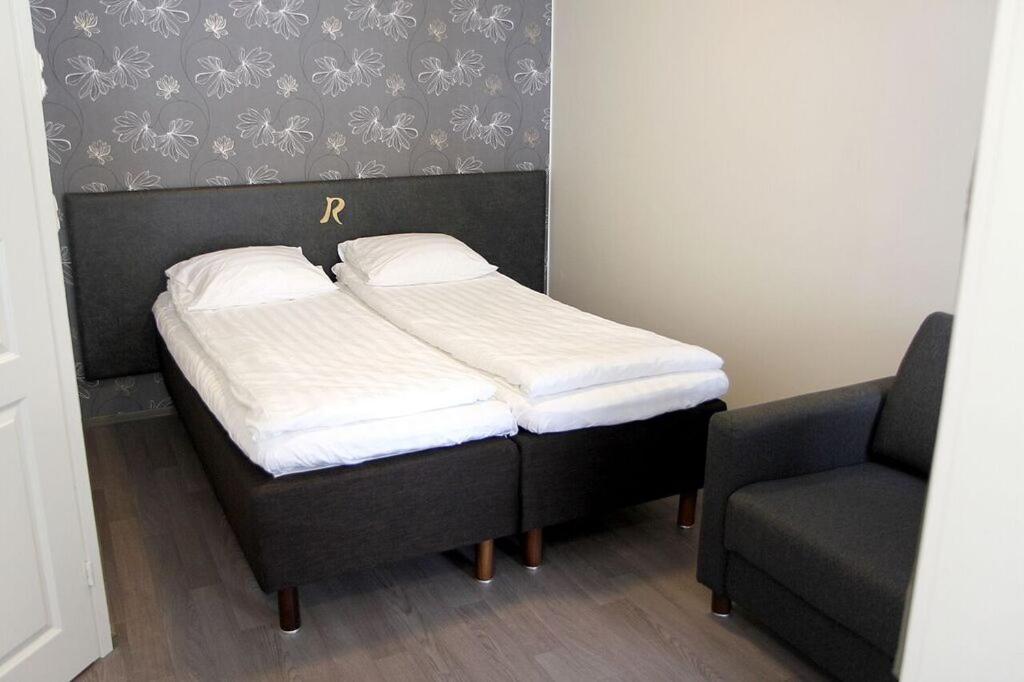 Ένα ή περισσότερα κρεβάτια σε δωμάτιο στο Rämäkkä Holidays