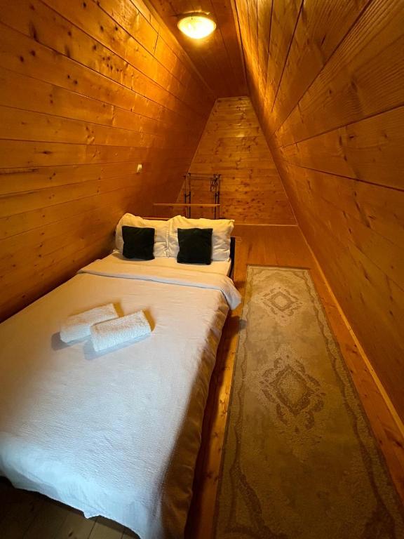 Postel nebo postele na pokoji v ubytování Casa Ursu