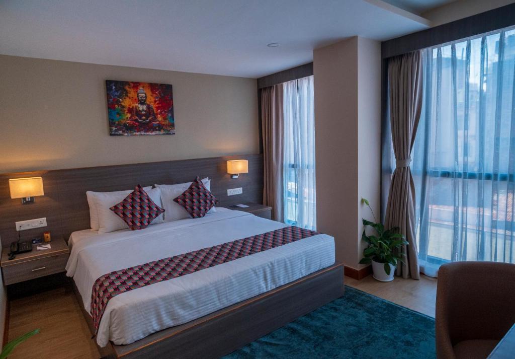 Postel nebo postele na pokoji v ubytování Siddhartha Hotel Damauli