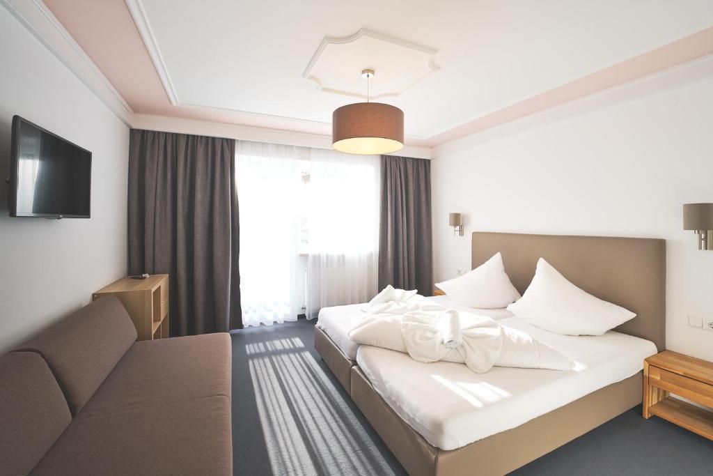 Postel nebo postele na pokoji v ubytování Hotel Gamshag