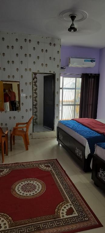 Voodi või voodid majutusasutuse Premshi Guest House toas
