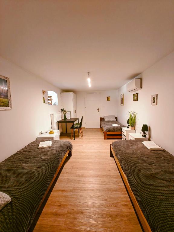 Winnica NOVI - apartamenty - Chambre Triple Avec Vue Sur Jardin