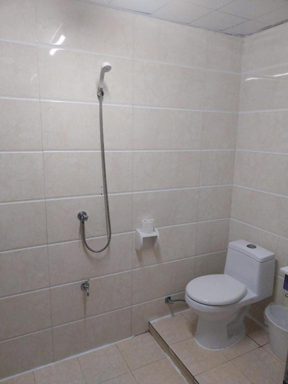 Koupelna v ubytování Britos Hotel