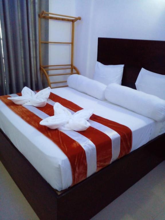 Postel nebo postele na pokoji v ubytování Wilroma Hotel&Resort