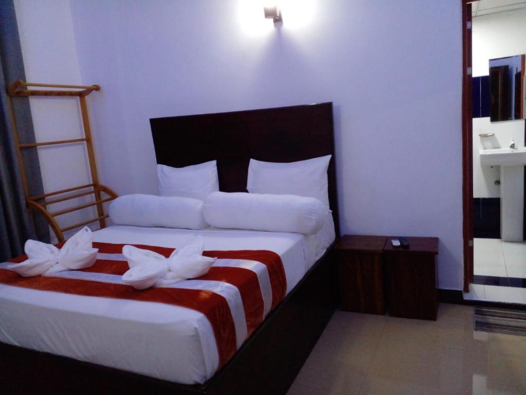 Postel nebo postele na pokoji v ubytování Wilroma Hotel&Resort