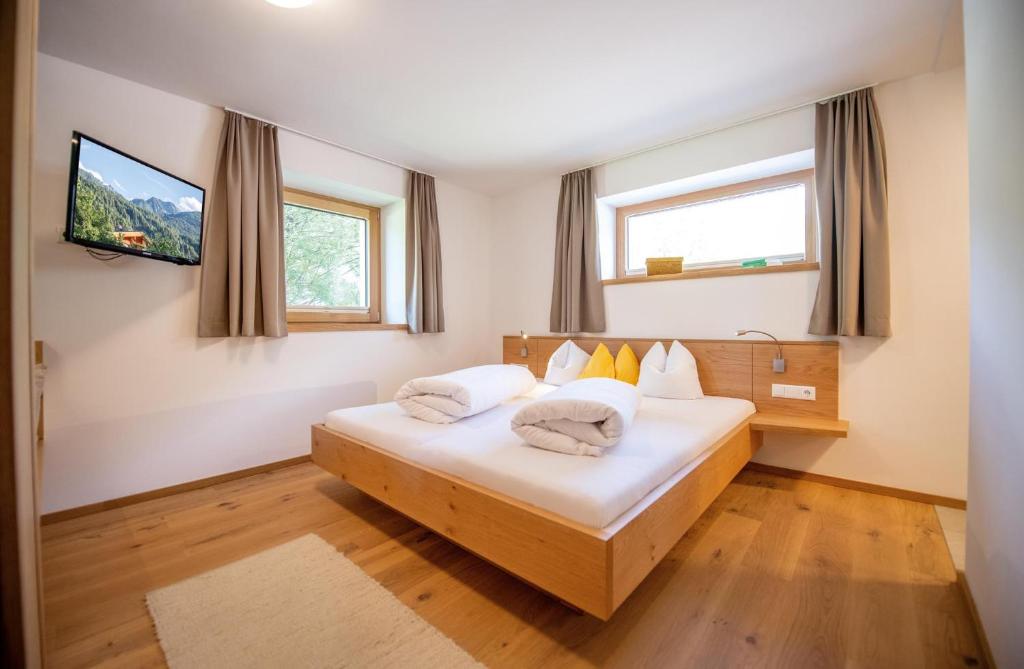 Postel nebo postele na pokoji v ubytování Hotel juenmi