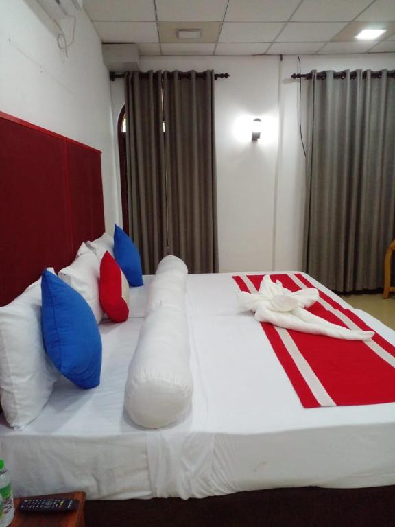 Postel nebo postele na pokoji v ubytování Wilroma Hotel&Resort