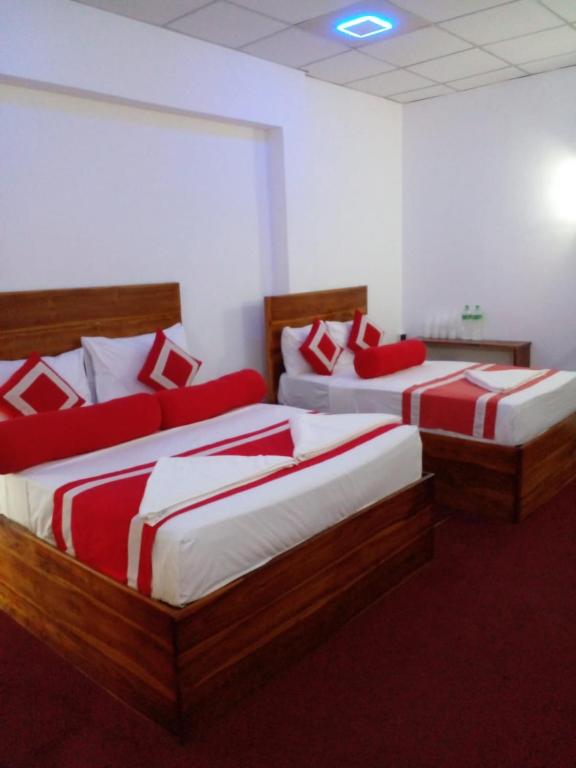 Postel nebo postele na pokoji v ubytování Wilroma Hotel&Resort