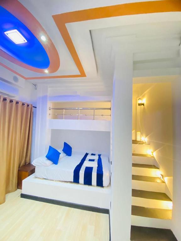 Postel nebo postele na pokoji v ubytování Wilroma Hotel&Resort