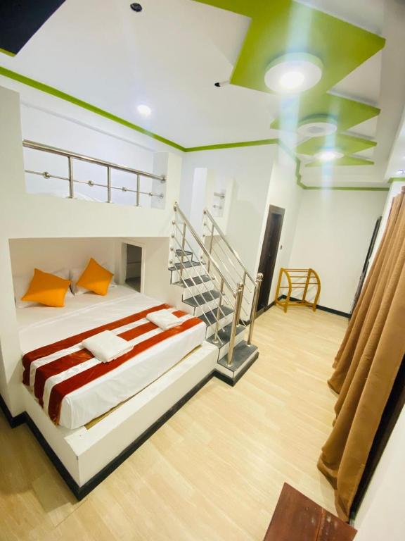 Postel nebo postele na pokoji v ubytování Wilroma Hotel&Resort