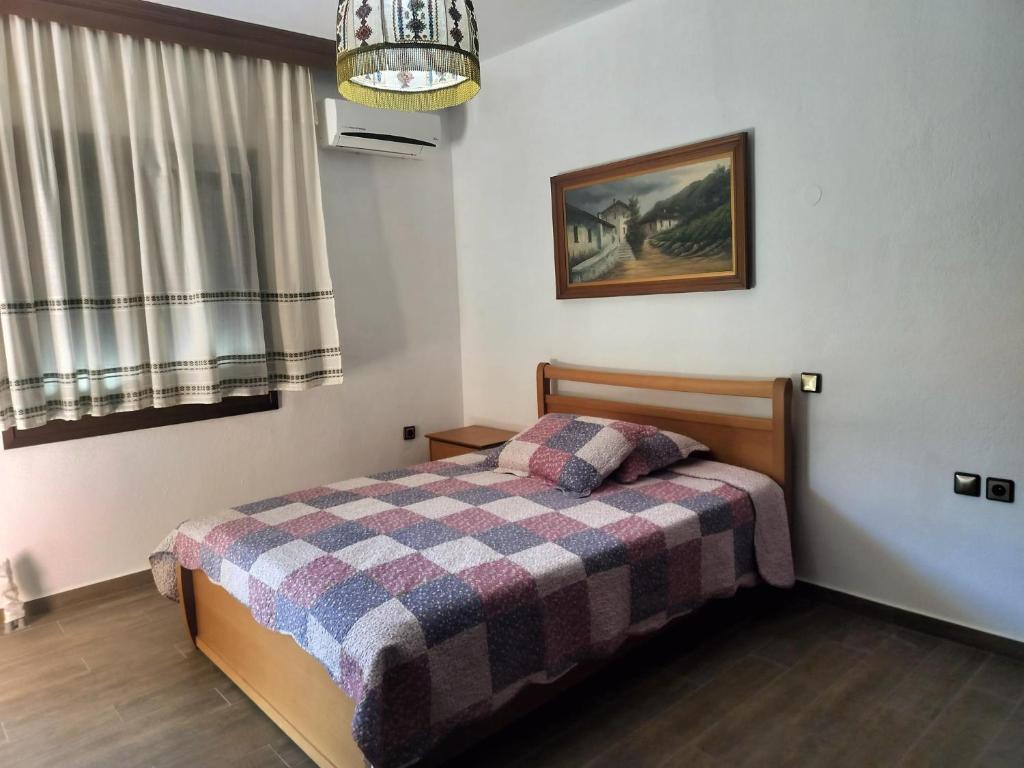 Postel nebo postele na pokoji v ubytování Olive's House