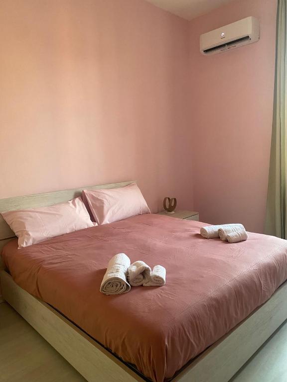 Postel nebo postele na pokoji v ubytování Marico Affittacamere Via Talarico civico 3