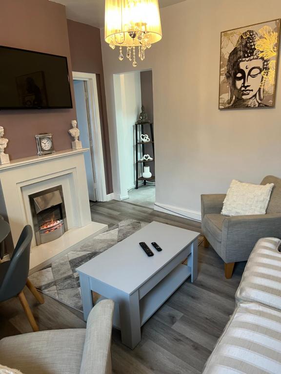 Posezení v ubytování 2 Bedroom Town apartment