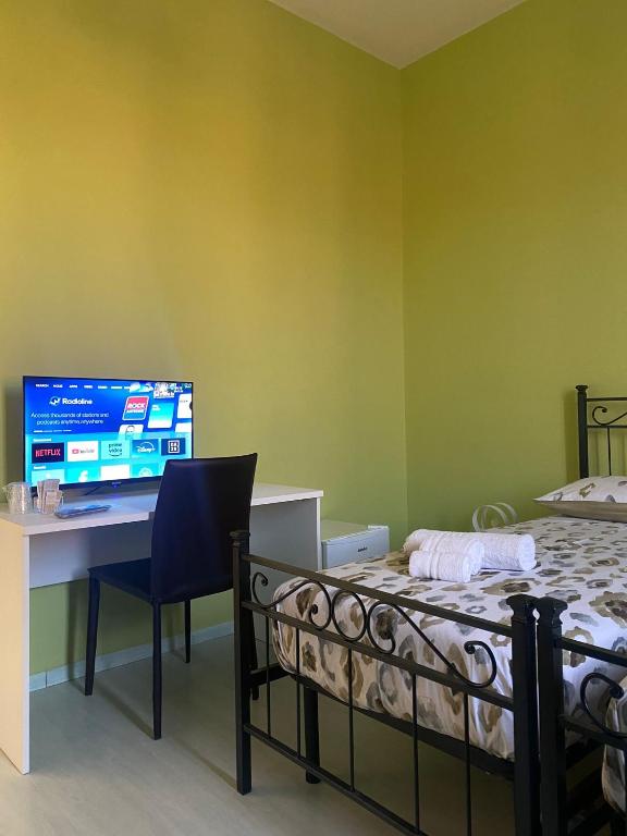 Postel nebo postele na pokoji v ubytování Marico Affittacamere Via Talarico civico 3