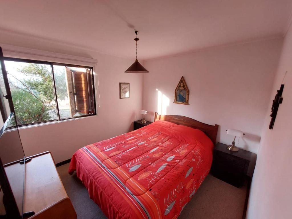 Postel nebo postele na pokoji v ubytování Cabana Algarrobo