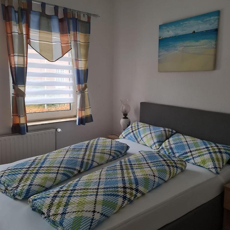 Postel nebo postele na pokoji v ubytování Ferienwohnung Trifkovic 2