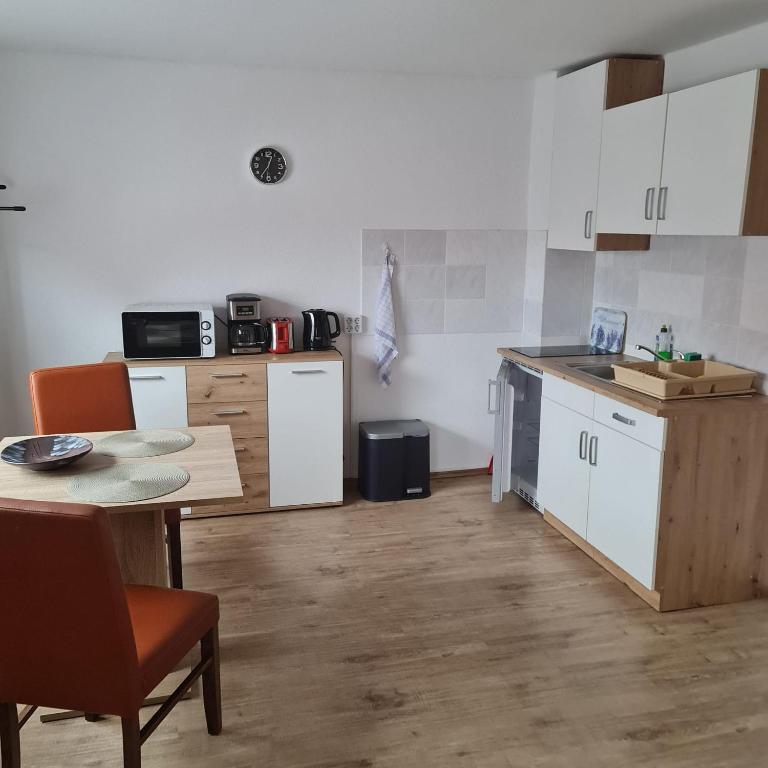 Kuchyň nebo kuchyňský kout v ubytování Ferienwohnung Trifkovic 1