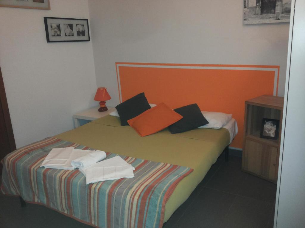 Postel nebo postele na pokoji v ubytování Dolce Notte