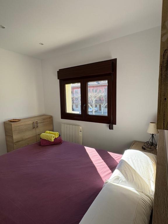 A bed or beds in a room at Villa Montserrat